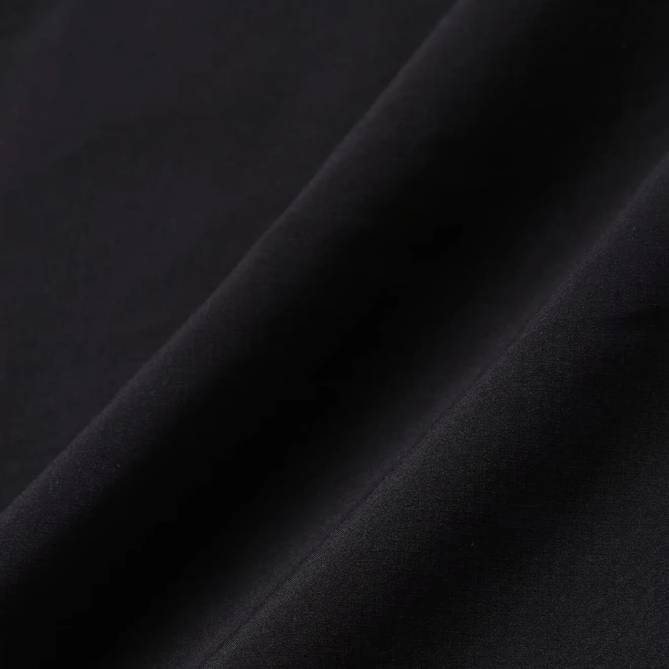 And Wander Pertex Shield Regenjacke Schwarz