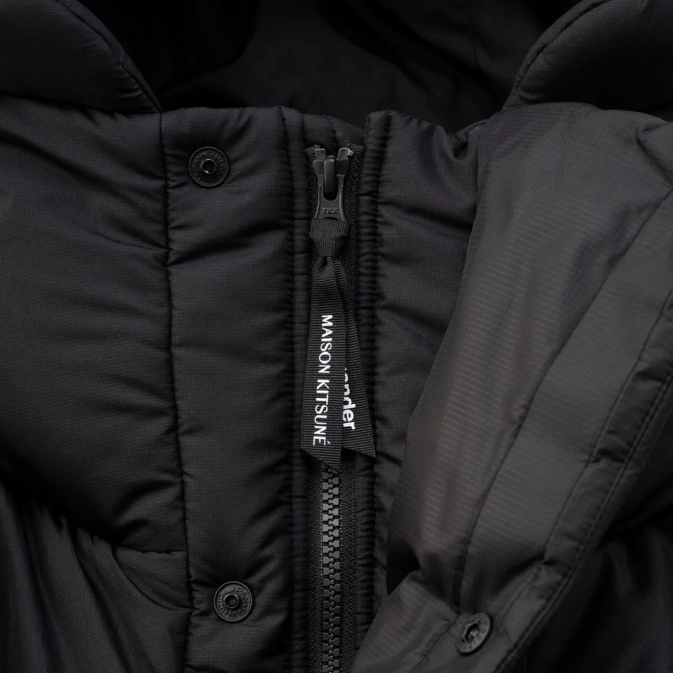 And Wander x Maison Kitsune Isolierjacke Schwarz