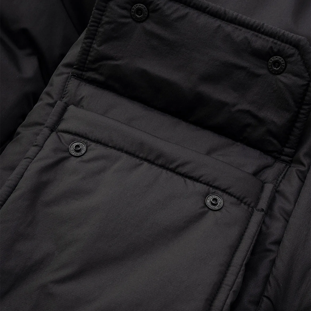 And Wander x Maison Kitsune Isolierjacke Schwarz