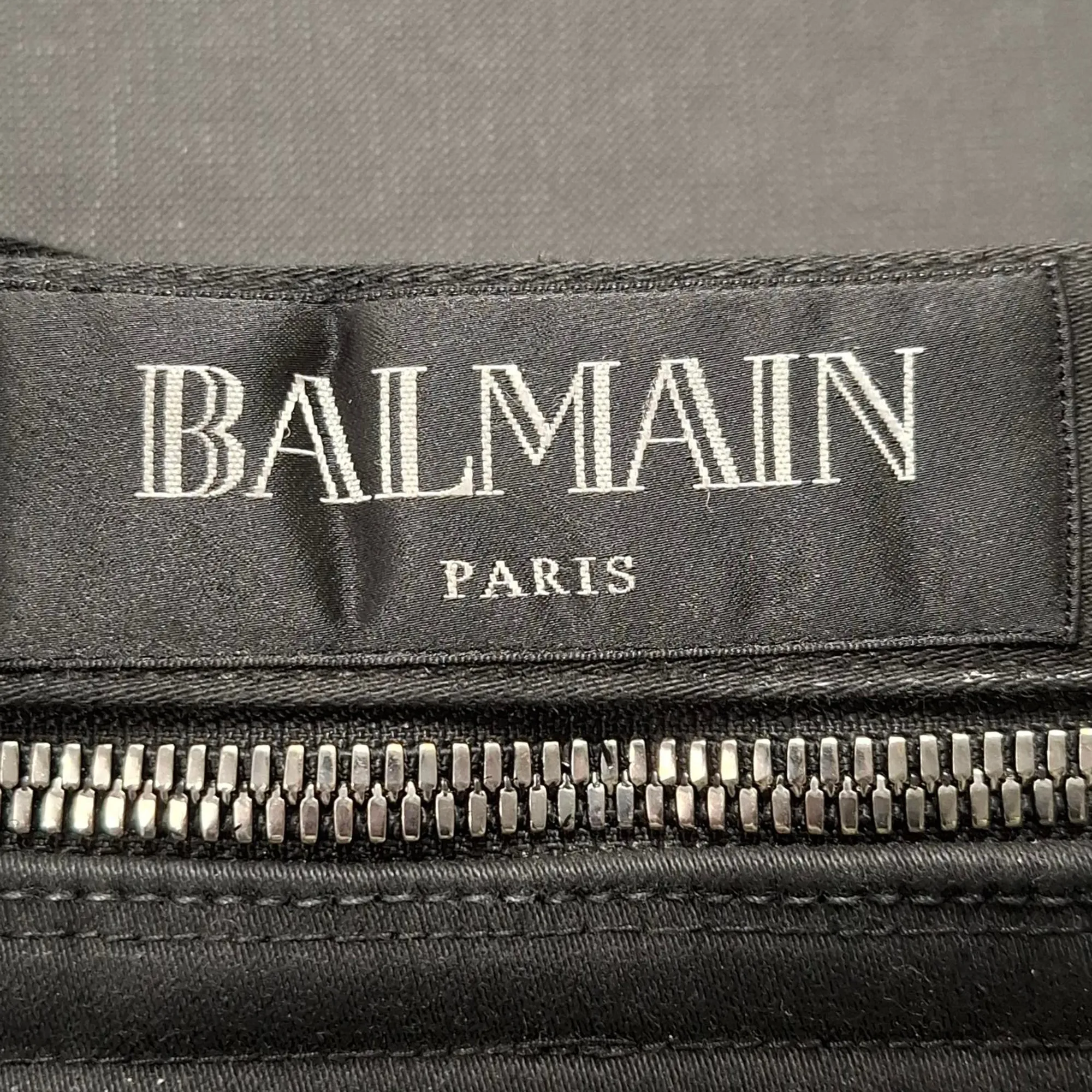 Balmain Gewachste Slim-Fit Bikerjeans in schwarzem Baumwoll-Denim