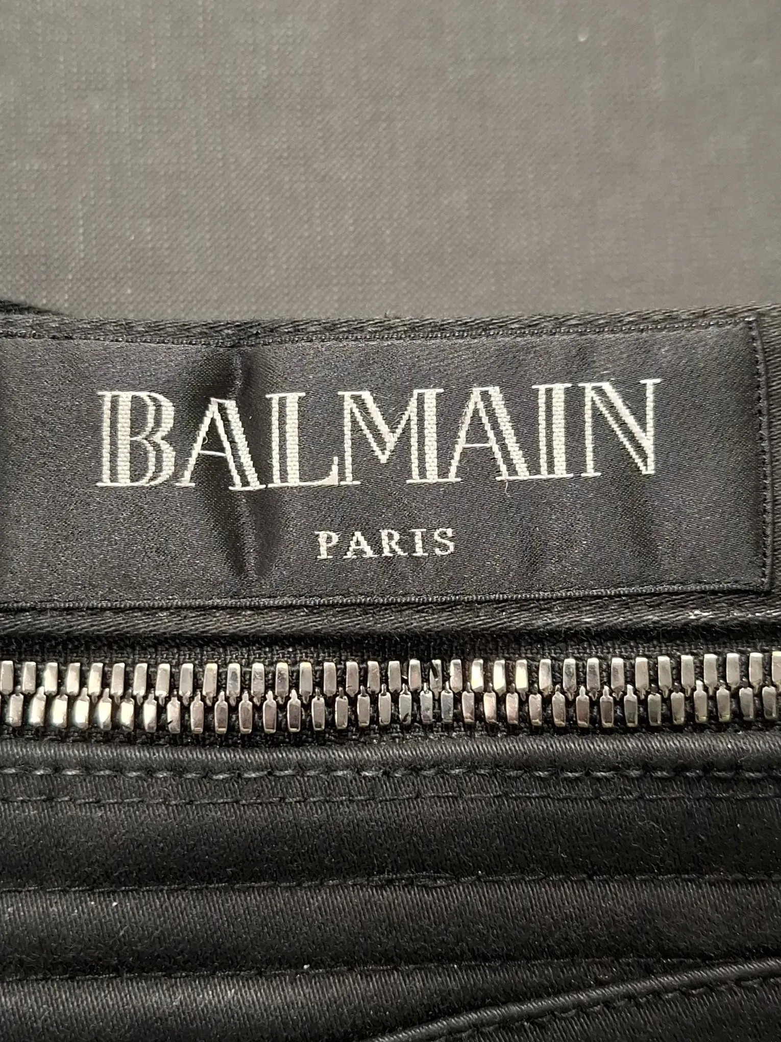 Balmain Gewachste Slim-Fit Bikerjeans in schwarzem Baumwoll-Denim