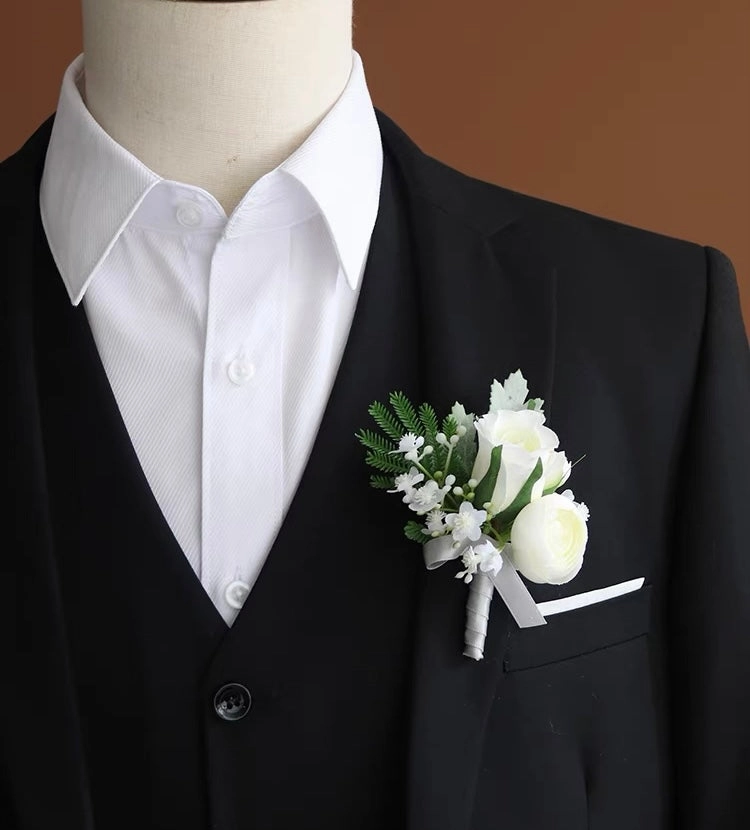 White boutonni??re corsages for bride groom best men mother ranunculus head band